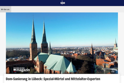 Luftaufnahme Dom zu Lübeck mit Banner NDR Schleswig-Holstein magazin und Play-Icon mitten im Bild - Copyright: Steffi Niemann